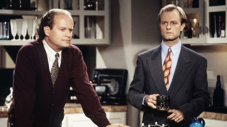 Frasier and Niles stand in the kitchen in 