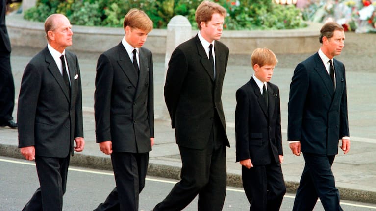 From left: Britain's Prince Philip, Prince William, Earl Spencer, Prince Harry and Prince Charles walk outside Westminster Abbey during the funeral procession for Diana.