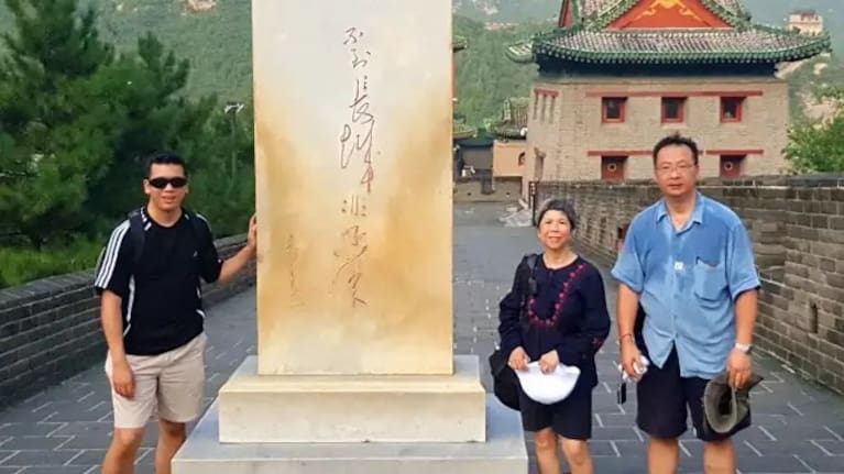 Fuk-Fu Joseph Kwok and his wife Mei Han Chong with their son.