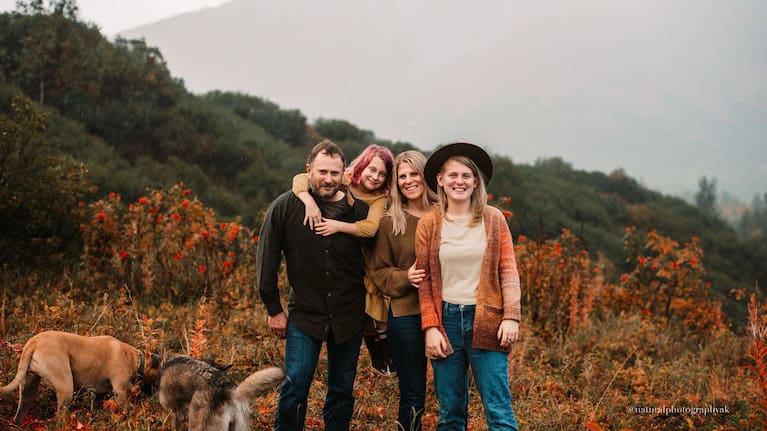 Greg King with his partner and two stepdaughters.