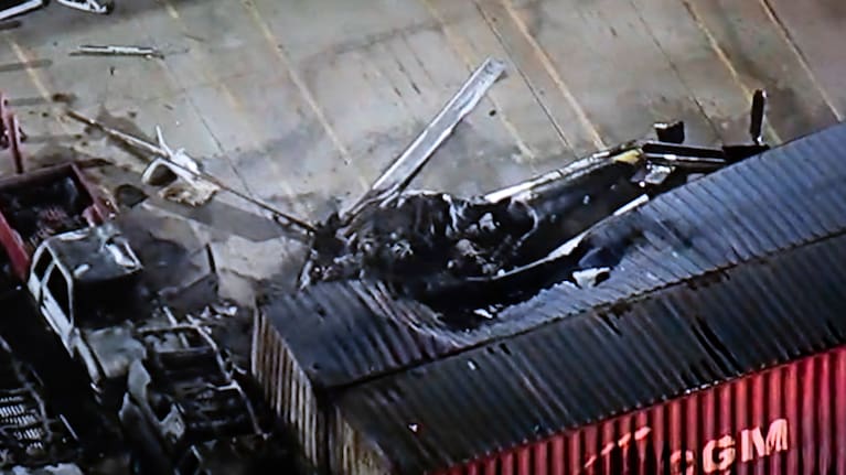 In this still image provided by KABC-TV shows a helicopter that crashed near a deadly bus crash, in Los Angeles