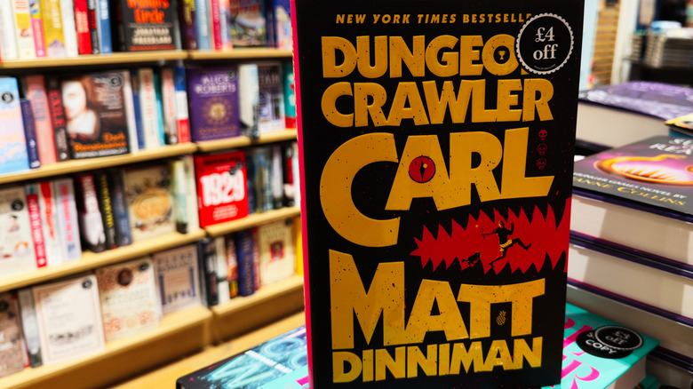 A book display of Dungeon Crawler Carl in a bookstore