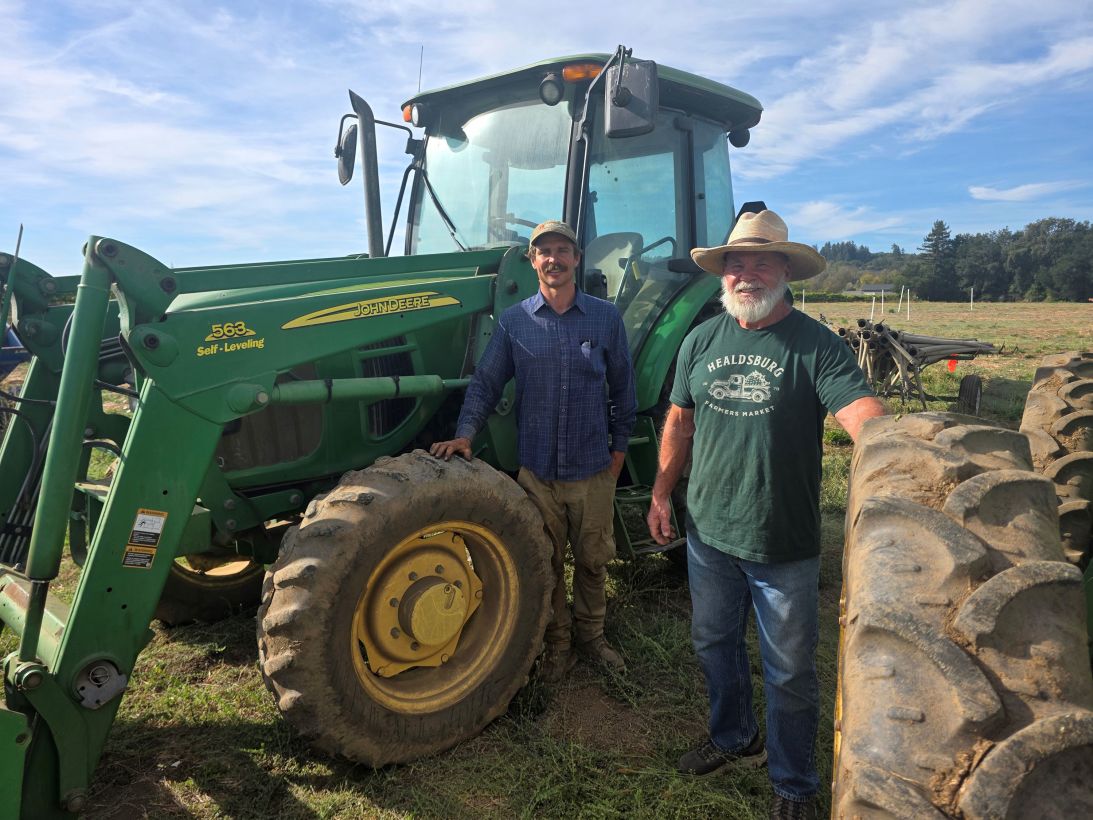 Sammy Tookey, left, and his stepfather, George Kibby, grow vegetables and fruits on Tookey's farm in northern California.