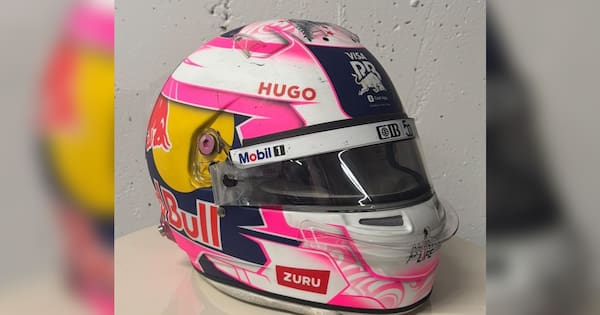 Liam Lawson's race-worn, signed F1 helmet up for auction