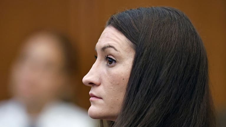 Lindsay Clancy listens to a witness on video during her murder trial at Plymouth Superior Court in Plymouth, Mass. (Source: Greg Derr/The Patriot Ledger via AP, Pool)