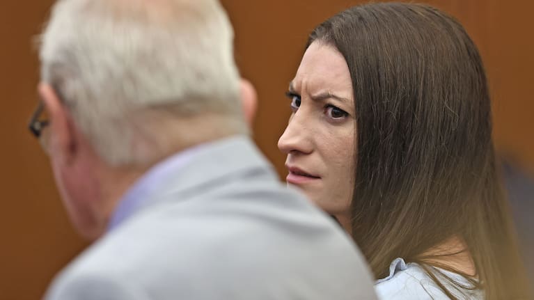Lindsay Clancy reacts to news that a woman was arrested for recording images of the jury at Plymouth Superior Court in Plymouth.