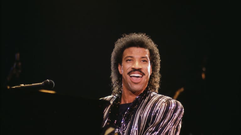 Lionel Richie, US singer-songwriter, during a live concert performance at Wembley Arena, London, England, Great Britain, May 1987.