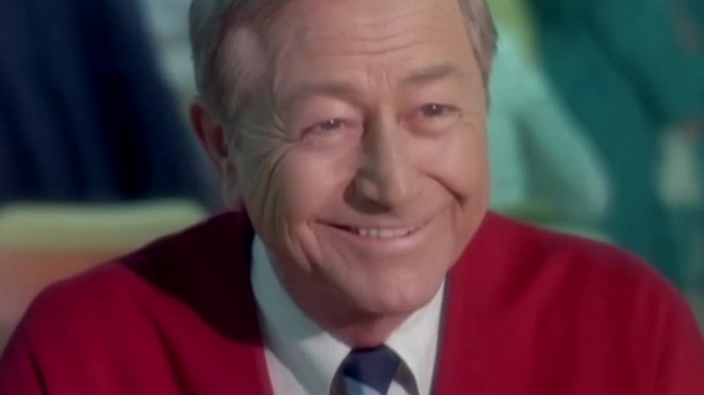 Robert Young as Marcus Welby on Marcus Welby, M.D., smiling in a red cardigan
