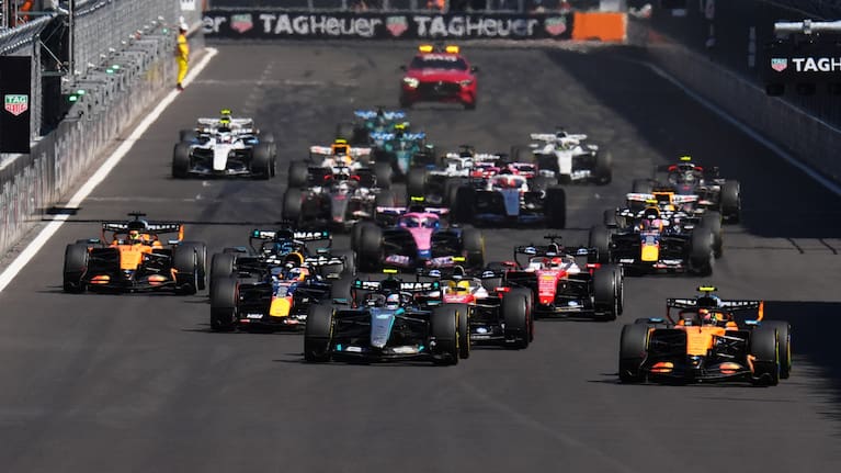 McLaren driver Lando Norris of Britain, right, leads the field after the start of the Spanish Formula One Grand Prix race in Madrid.