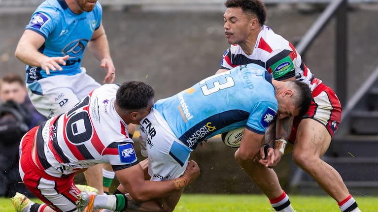 Northland Heremaia Murray is tackled by Counties Manukau AJ Alatimu and Counties Manukau Josh Gray.