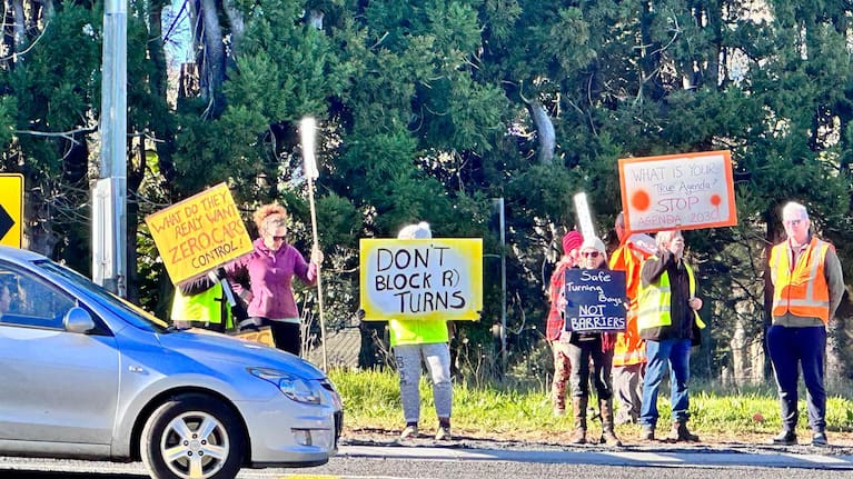 One of several protests against the median barriers.