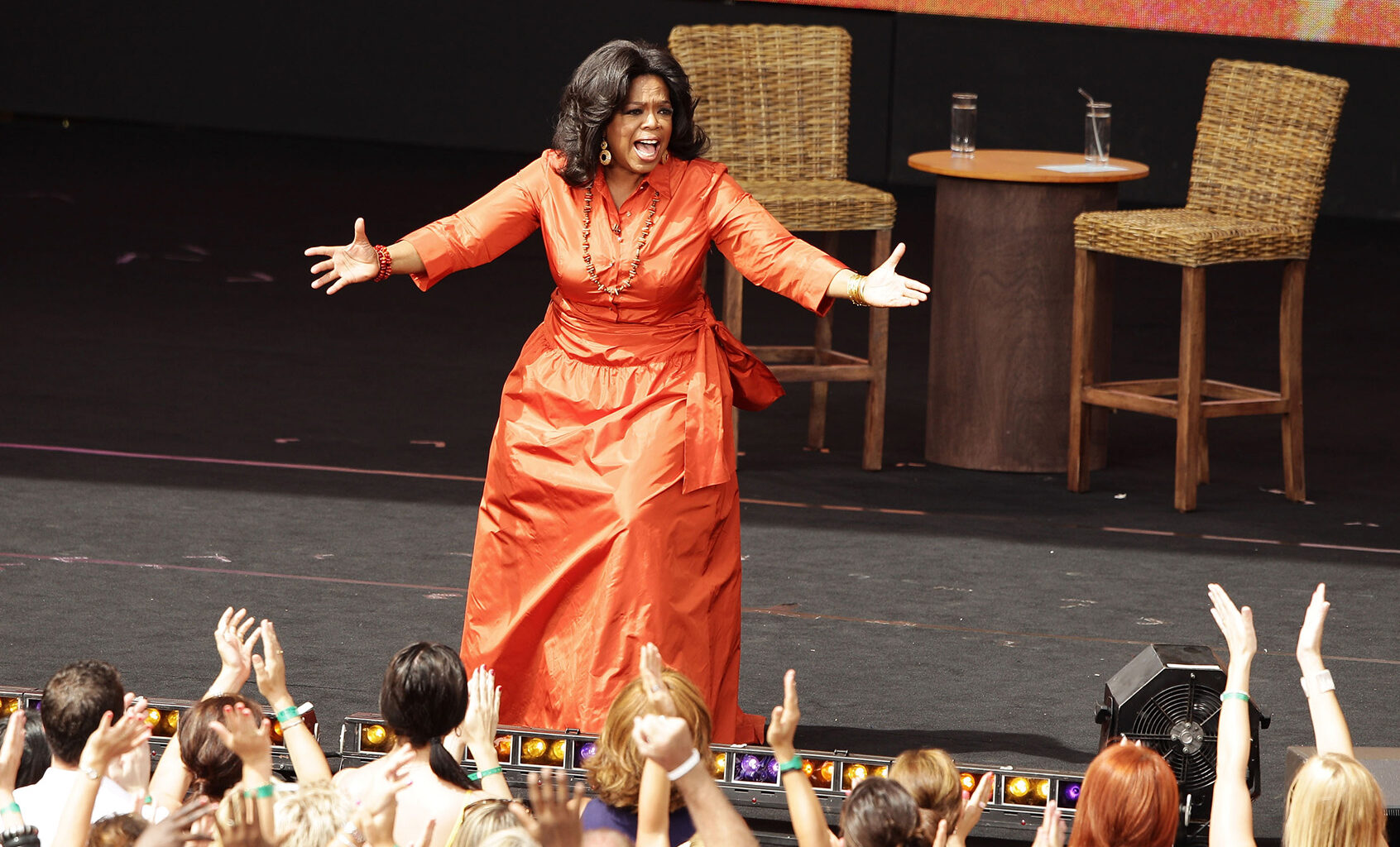Oprah Winfrey gestures during a taping of "The Oprah Winfrey Show" at the Sydney Opera House in Australia on Dec. 14, 2010. The episodes aired in January 2011 as part of the show's 25th and final season. (Brendon Thorne / Getty Images)