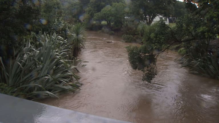 Partial flooding of the Piha Domain campground in 2018.