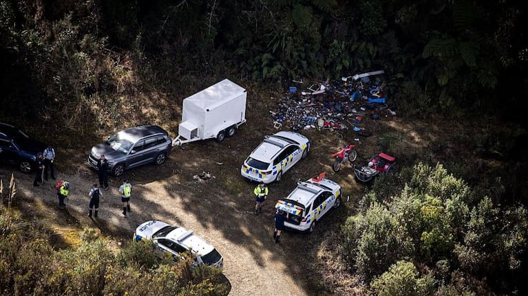 Police with items believed to have been used by Tom Phillips.  (Getty/ NZME)