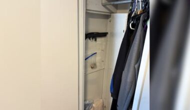 Gun and meth ingredients found behind fake wall during Auckland raid