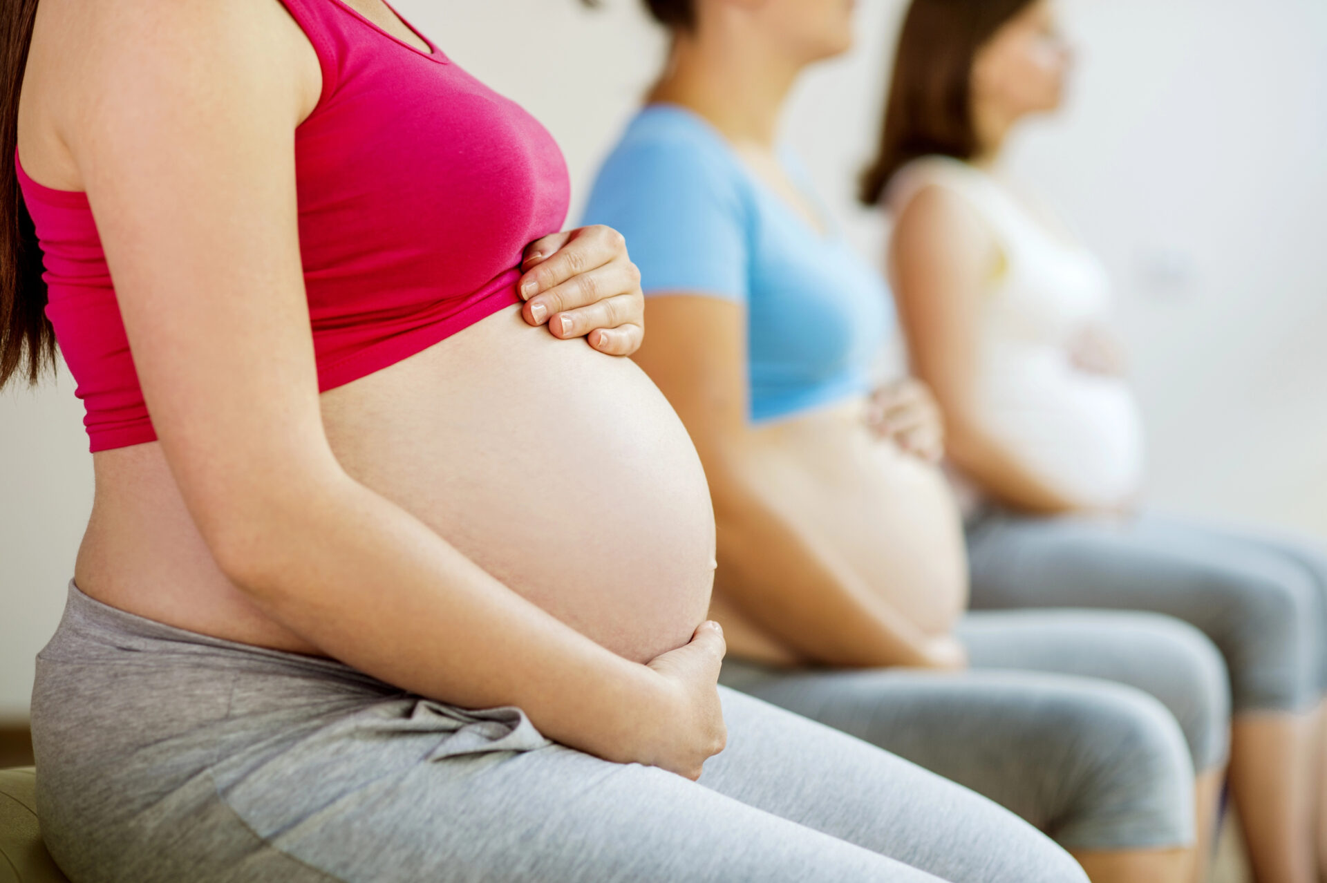 Pregnant women sitting in class