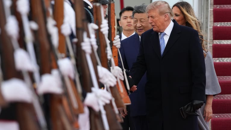 President Donald Trump and first lady Melania Trump, along with China's President Xi Jinping and his wife Peng Liyuan participate in an arrival ceremony at Joint Base Andrews.
