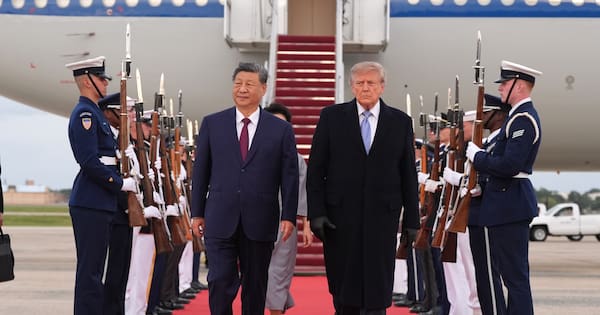 Trump greets Xi in Washington with rare red-carpet airport welcome
