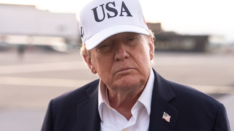 President Donald Trump speaks with reporters