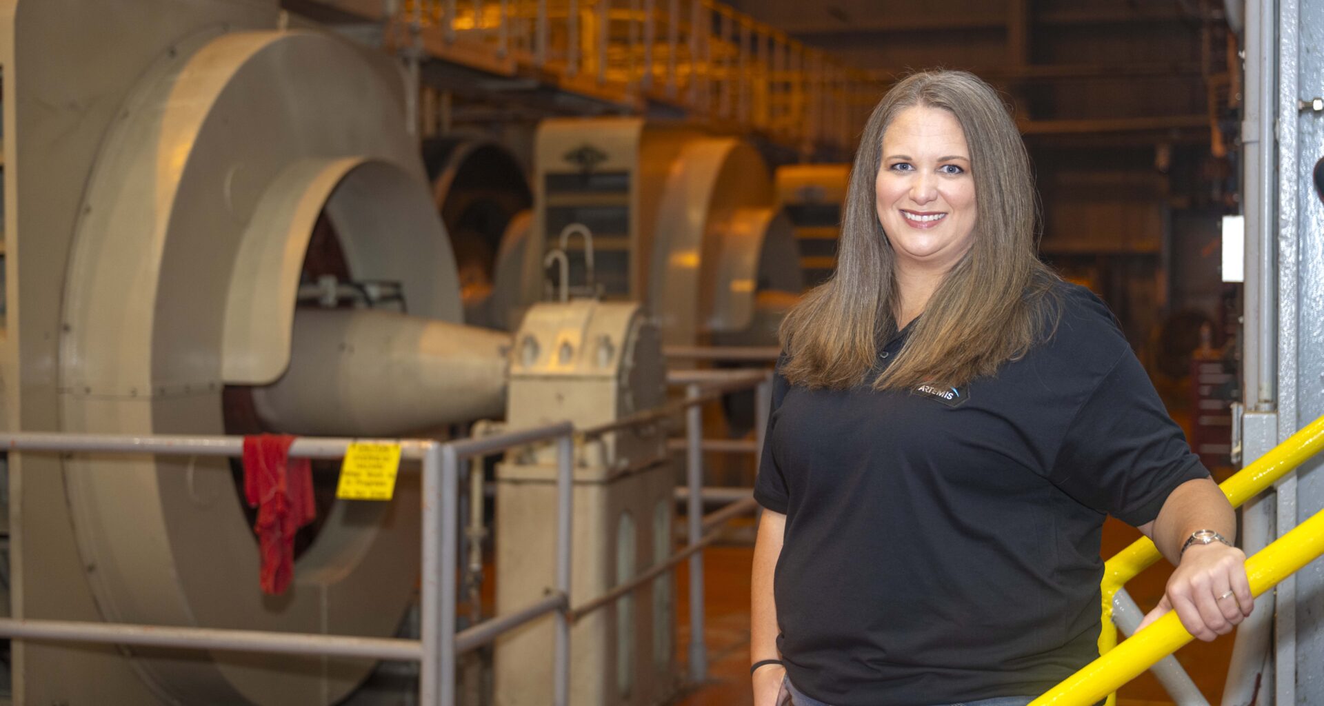 Kristie Foster, a quality engineer at NASA’s Stennis Space Center, stands inside the High Pressure Industrial Water Facility in Bay St. Louis, Mississippi, during a photo session on September 10, 2026.