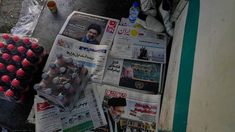The front pages of Iranian newspapers show portraits of the Iranian Supreme Leader Ayatollah Mojtaba Khamenei, and headlines regarding the Shajareh Tayyebeh school that was hit in an airstrike .