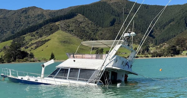 Boat partly submerged in Marlborough Sounds sparks oil spill response