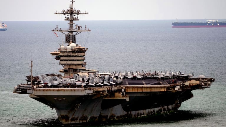 The US Navy aircraft carrier USS Abraham Lincoln arrives at the port in Laem Chabang, Chonburi, Thailand. 
