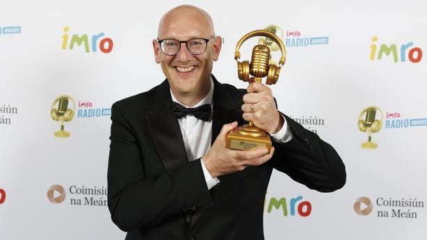 Justin McCarthy with his News Broadcaster of the Year award.