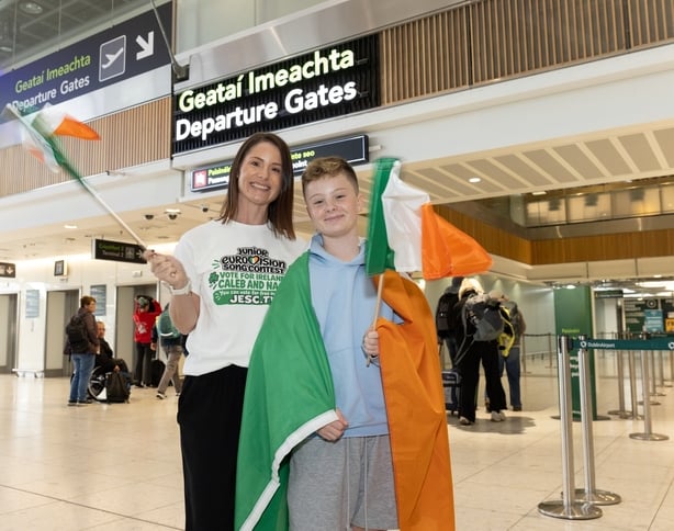Caleb Kirwan and mother Jen at Dublin Airport Photo: Bryan Brophy ©All Rights Reserved