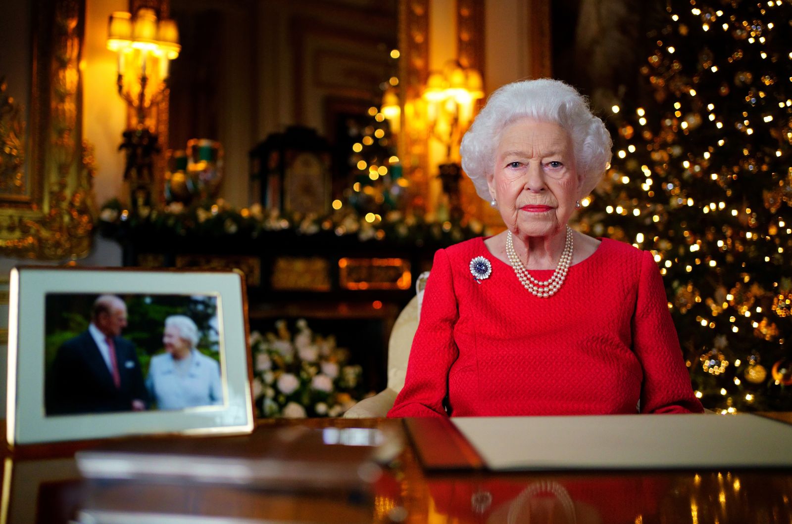 Queen Elizabeth II records her annual Christmas broadcast in the White Drawing Room at Windsor Castle in 2021. It was...