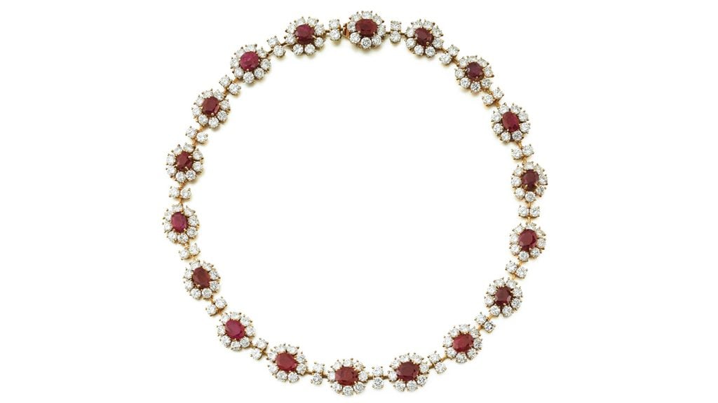An M. Gérard necklace comprises 18 oval Burmese rubies, each framed by eight brilliant-cut diamonds, with the clusters spaced by pairs of brilliant-cut stones. The diamonds total around 36 carats at Sotheby's image