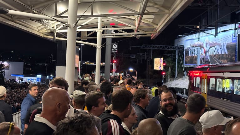 Rugby fans waiting at Kingsland station.
