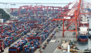 Containers are stacked at a port in the southeastern city of Busan, Oct. 1. Yonhap