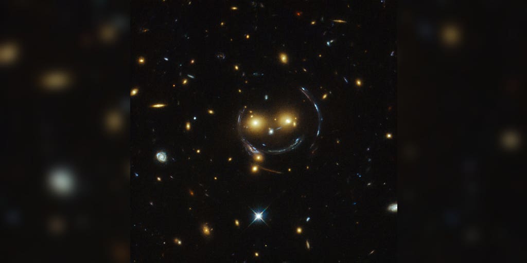 Cluster of galaxies in the universe form a smiley face