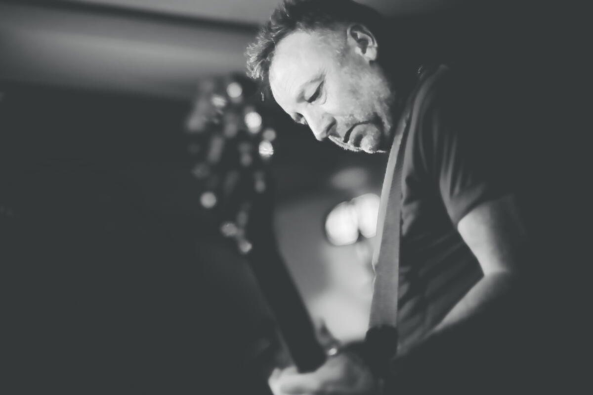 Bass player in black and white
