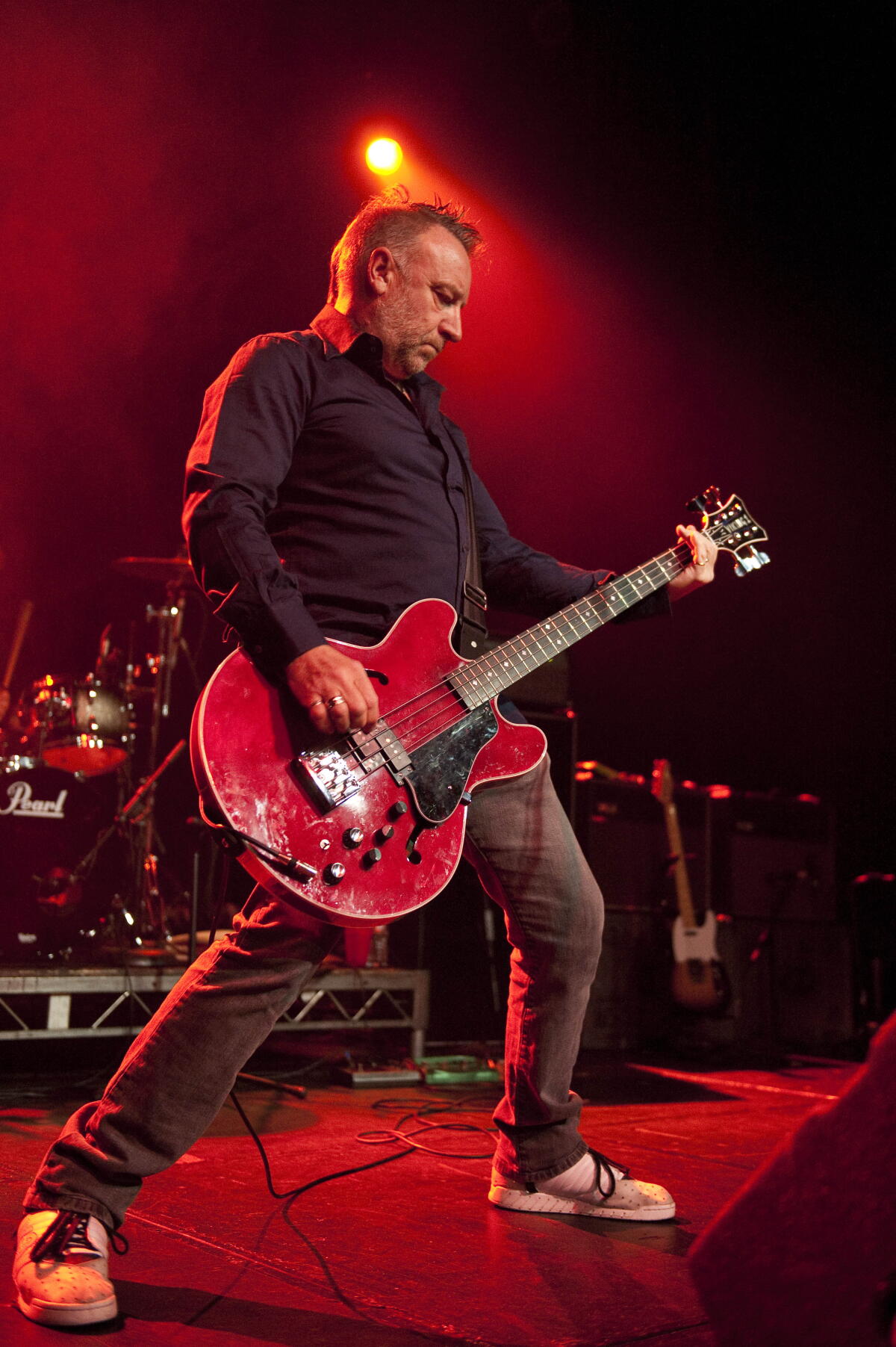 Bassist performing on stage