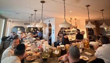 Guests dining at the chef's counter at Mutra in North Miami
