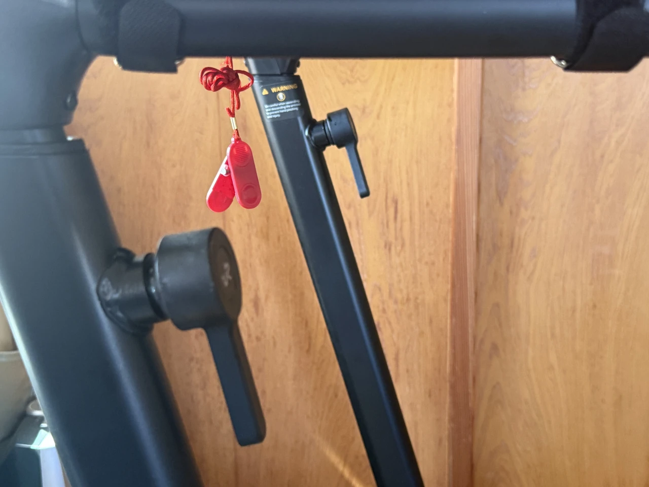 The height of the work desk or screen holder can be adjusted easily, and there's a safety switch within reach
