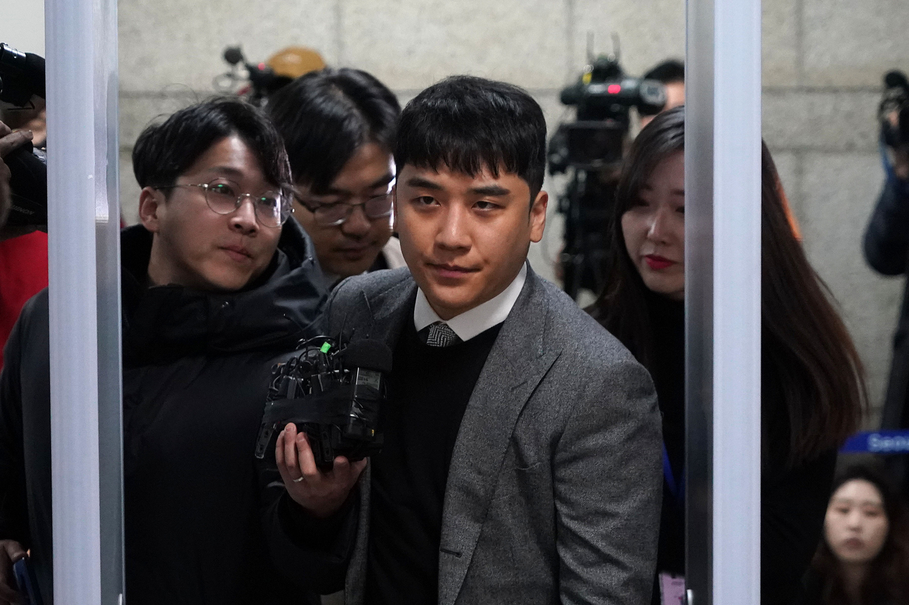 Seungri arrives for a hearing at the Seoul Central District Court on Jan. 13, 2020. (Getty Images)