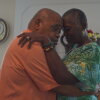 Caregiver Malcoma Brown-Ekeogu and her husband, Kenneth, dance on their wedding anniversary. Both are featured in Caregiving.