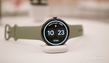 Google Pixel Watch 5 on its charging dock.