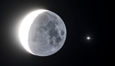 A view of the crescent Moon and Jupiter, with Jupiter