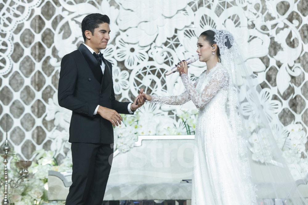 Bella Astillah performs ‘Bersama Aku Setia Selamanya’, a new song composed by Hael Husaini, as a special dedication to Syed Saddiq to close their wedding reception in Kuala Lumpur on October 18, 2026. — Picture courtesy of Astro
