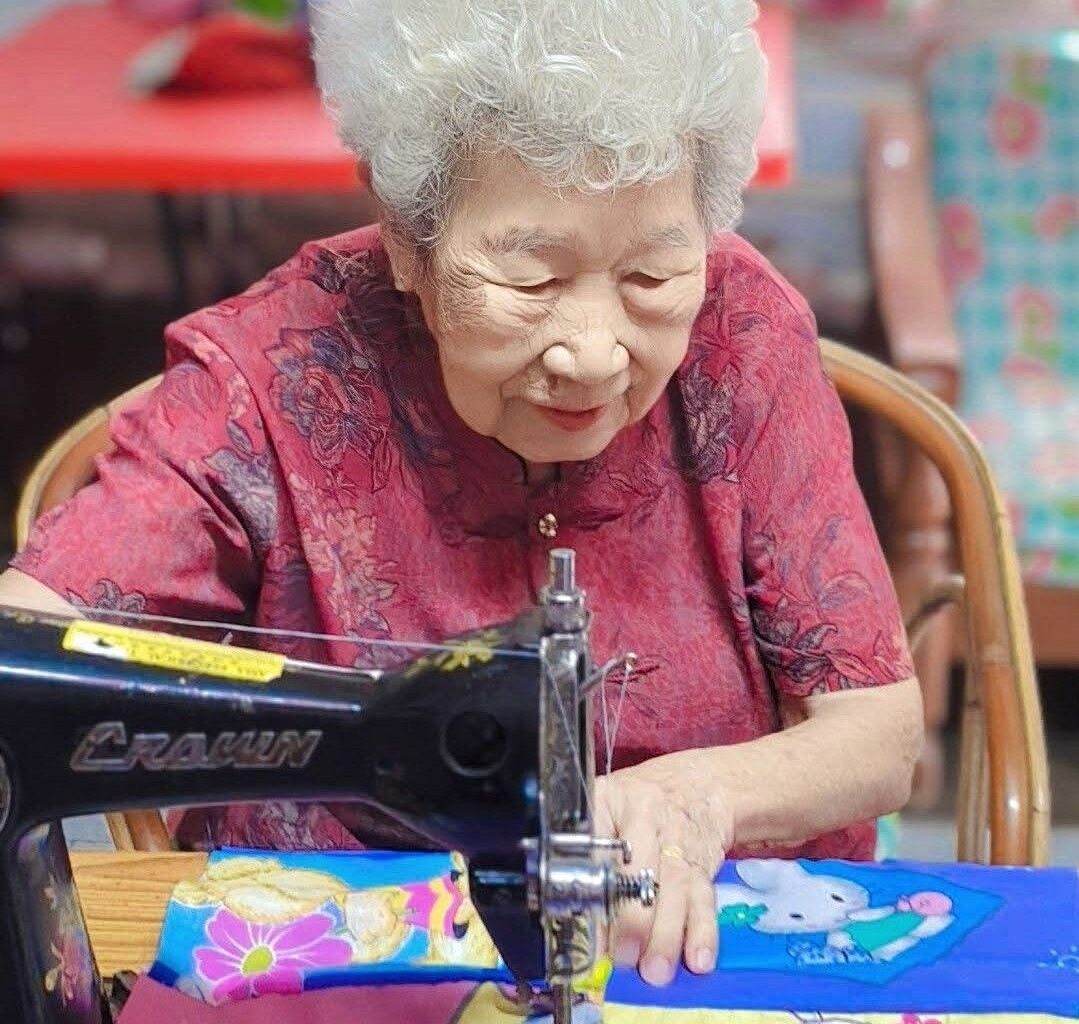 Sewing patchwork from upcycled material keeps 92YO Malaysian great-grandma active