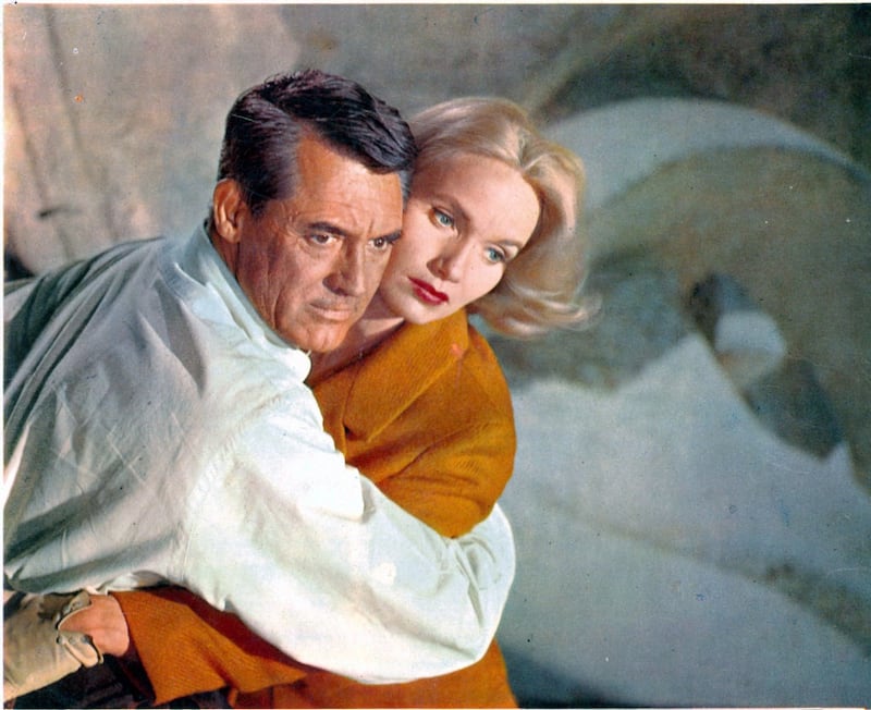 Cary Grant holding Eva Marie Saint in a scene from the 1959 film North by Northwest. Photograph: Metro-Goldwyn-Mayer/Getty Images