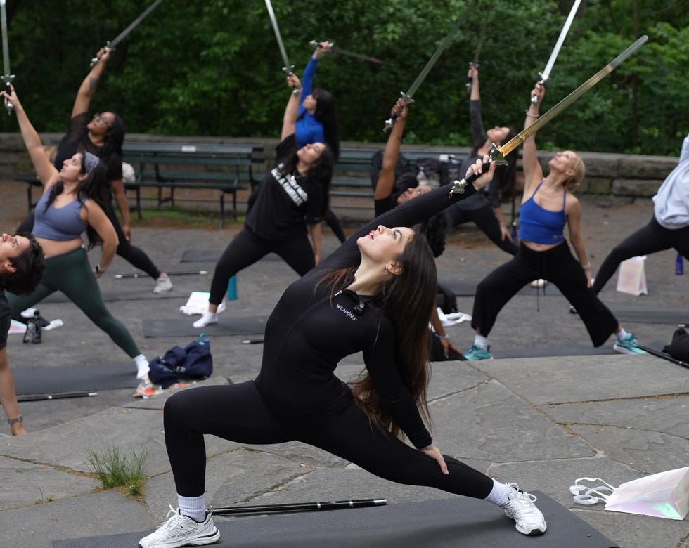 WeaponUp founder Sabina Storberg teaching a sword yoga class