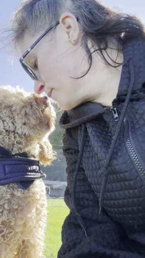 Joanne Marshall and her service dog Kiko