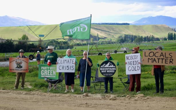 Protesters outside the Bendigo-Ophir mine site in the Dunstan Mountains on Tuesday.