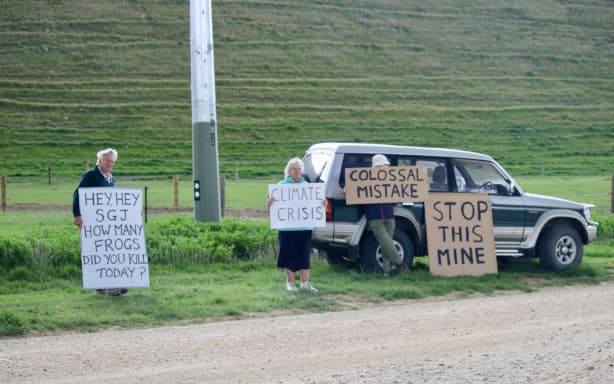 Protesters outside the Bendigo-Ophir mine site in the Dunstan Mountains on Tuesday.