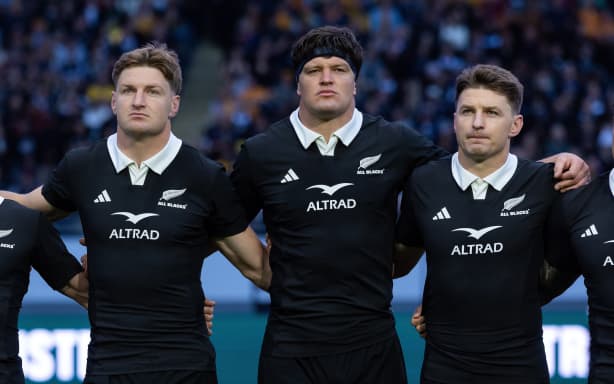 New Zealand All Blacks brothers, Jordie, Scott and Beauden Barrett during the national anthems before the Bledisloe Cup after the New Zealand All Blacks v Australia Wallabies, Bledisloe Cup Rugby Test Match at Eden Park, Auckland, New Zealand on Saturday 10th October 2026. Photo: Brett Phibbs / Photosport